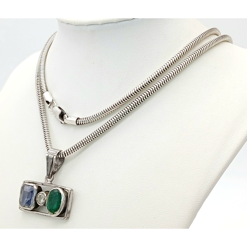 305 - A HERRINGBONE SILVER NECK CHAIN WITH A 3 STONE PENDANT .      36.5gms     80cms