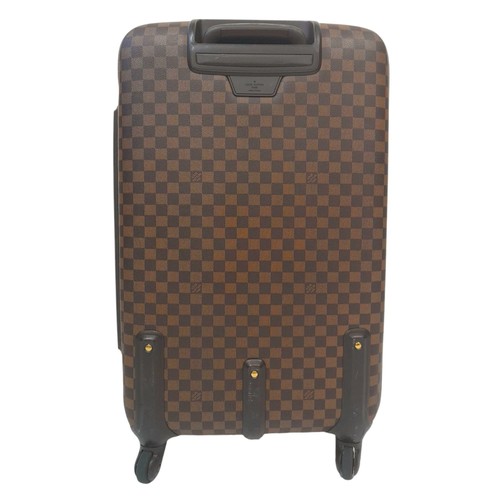 150 - A Louis Vuitton Damier Ebene Canvas Zephyr 70 Rolling Suitcase. Brown and tan monogram coated canvas... 