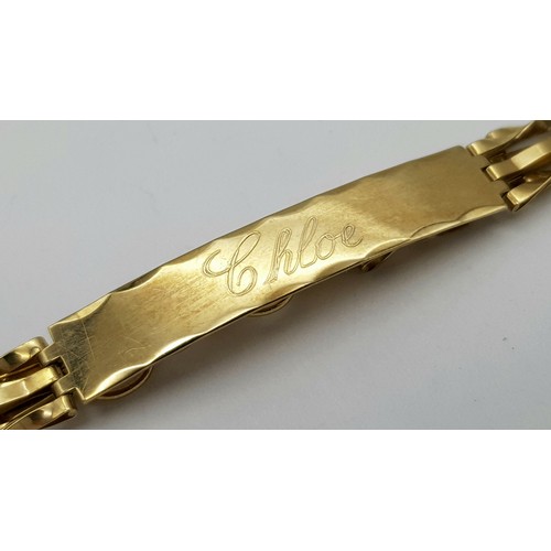 233 - A 9K Yellow Gold Identity Bracelet with Gate Links. 16cm. 3.3g