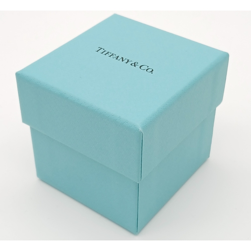 157 - A TIFFANY 950 PLATINUM BAND RING IN THE ORIGINAL TIFFANY RING BOX AND PACKAGING.   4.8gms    size N