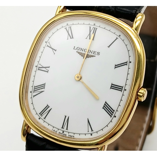 377 - A Classic Longines Quartz Gents Watch. Black leather strap. Gilded case - 32mm. White dial with Roma... 