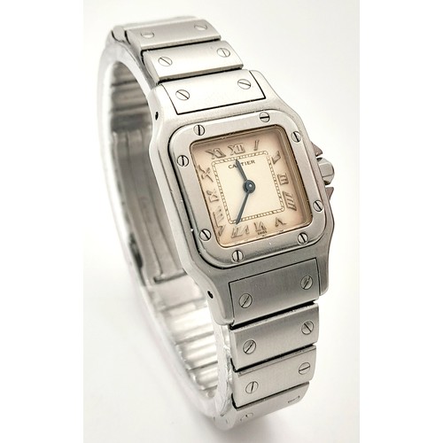 27 - A Vintage Cartier Santos - Model 1565 Quartz Ladies Watch. Stainless steel bracelet and case - 24mm.... 