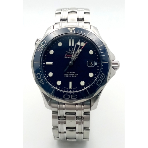 13 - An Omega Seamaster 300M Automatic Gents Watch. Stainless steel bracelet and case - 41mm. Blue dial w... 