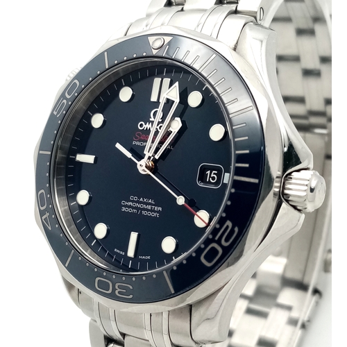 13 - An Omega Seamaster 300M Automatic Gents Watch. Stainless steel bracelet and case - 41mm. Blue dial w... 