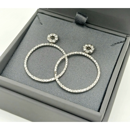 171 - A STUNNING PAIR OF 14K WHITE GOLD DIAMOND HOOP EARRINGS.   4.2gms