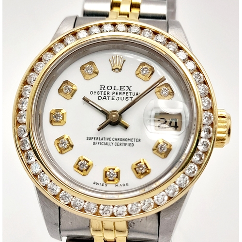 208 - A Rolex Bi-Metal and Diamond Ladies Datejust Watch. 18k gold and stainless steel bracelet. Case - 28... 