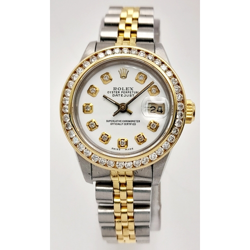 208 - A Rolex Bi-Metal and Diamond Ladies Datejust Watch. 18k gold and stainless steel bracelet. Case - 28... 