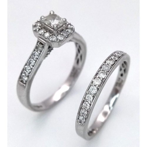 513 - Two Platinum Diamond Rings. A 0.77ctw two level size S and a diamond half eternity size S. 10.2g tot... 