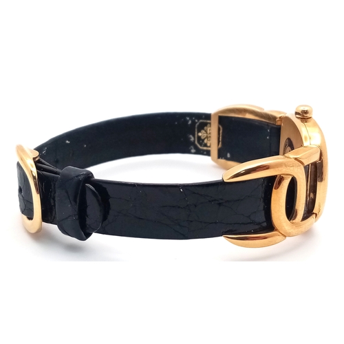 65 - A  Patek Phillipe 18K Gold Cased and Buckle  Ladies Watch.  18K Gold elegant case - 24mm.