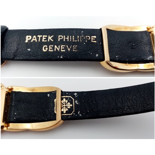 65 - A  Patek Phillipe 18K Gold Cased and Buckle  Ladies Watch.  18K Gold elegant case - 24mm.