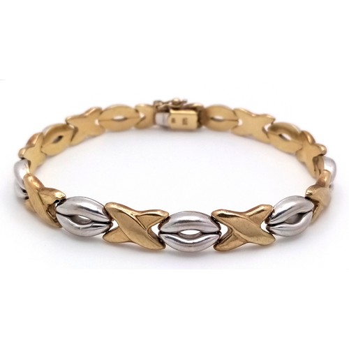 205 - A 9K Yellow and White Gold Fancy Link Bracelet. 16cm. 12.3g