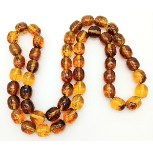 1478 - A Champagne Coloured Large Resin Bead Necklace. 2.5cm beads. 104cm.