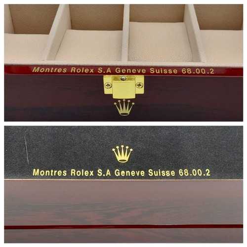 514 - An Excellent Condition Cherry Wood Piano Finish 12 Watch Dealer Display Box. 31.5x21x8cm.