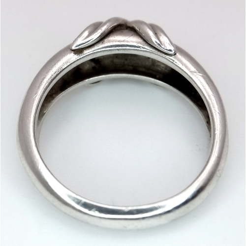 139 - A Vintage Tiffany and Co. 925 Sterling Silver Love knot Ring. Size R.