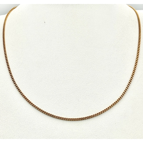 143 - An 18K Gold Petit Curb Link Chain necklace. 38cm. 5g