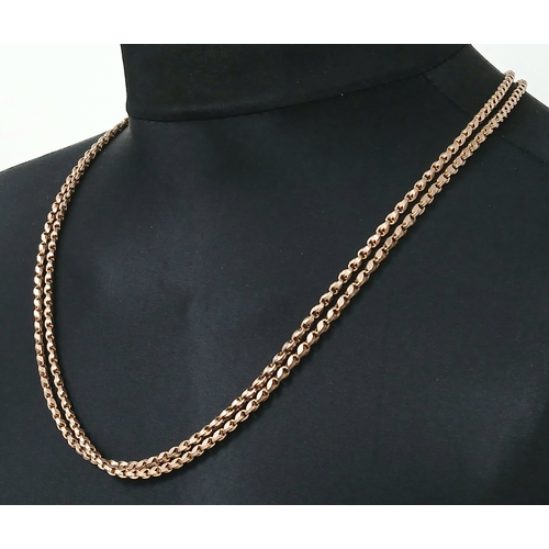 148 - An Incredible 9K Gold Antique Long Chain. Lobster clasp with a hanging ring pendant. 146cm. 48.4g