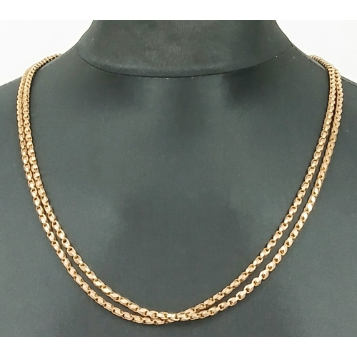 148 - An Incredible 9K Gold Antique Long Chain. Lobster clasp with a hanging ring pendant. 146cm. 48.4g