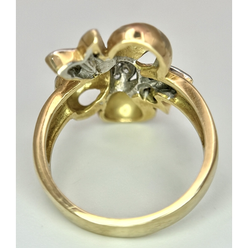 176 - A 14K Yellow and White Gold Ring. Floral form. Size N 1/2. 7.2g.