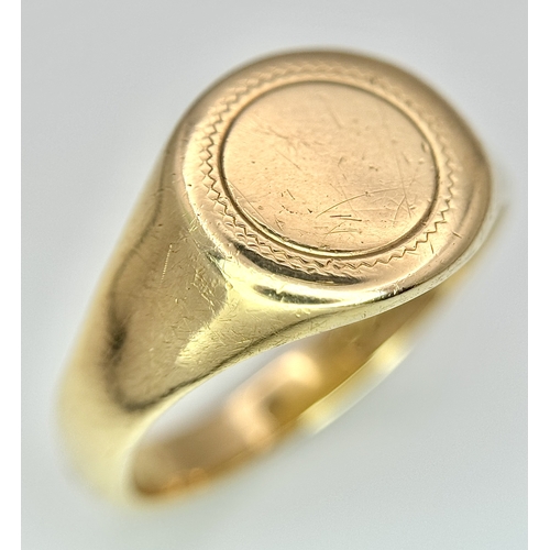 183 - A 9K Yellow Gold Signet Ring. Full UK hallmarks. Size S. 4.9g