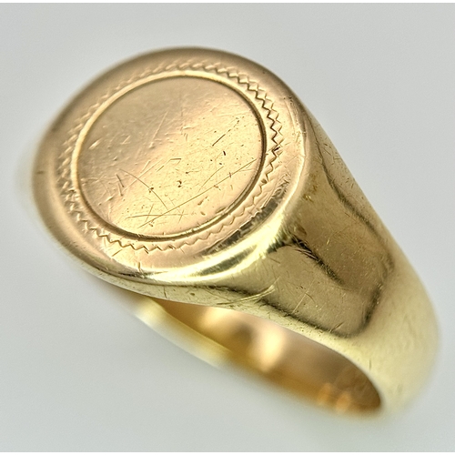 183 - A 9K Yellow Gold Signet Ring. Full UK hallmarks. Size S. 4.9g