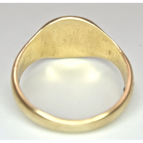 183 - A 9K Yellow Gold Signet Ring. Full UK hallmarks. Size S. 4.9g