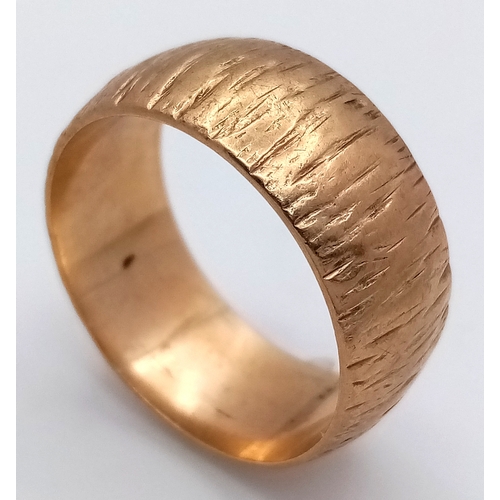 204 - A Vintage 9K Yellow Gold Bark Effect Band Ring. 10mm width. Size V. 8.67g