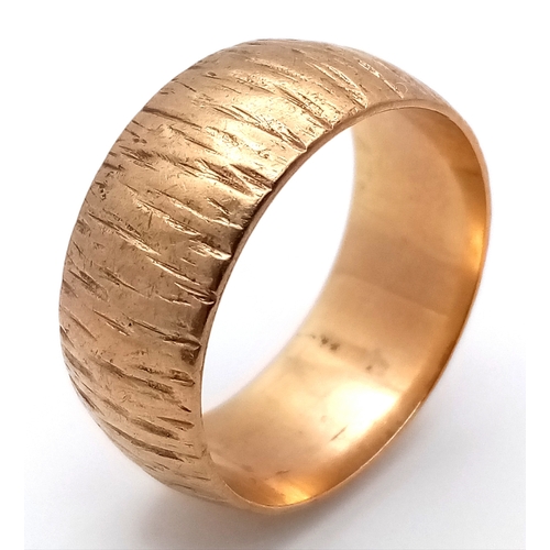 204 - A Vintage 9K Yellow Gold Bark Effect Band Ring. 10mm width. Size V. 8.67g