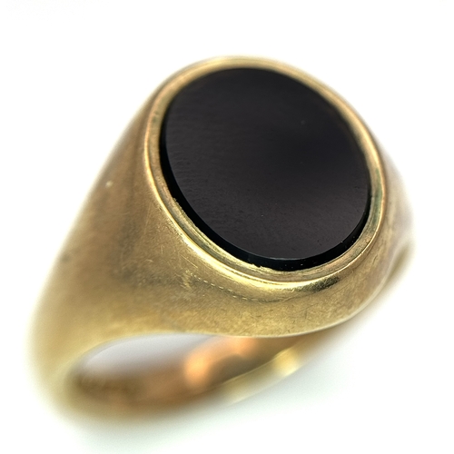 239 - A Vintage 9K Yellow Gold Onyx Signet Ring. Size S 1/2. 7.7g.