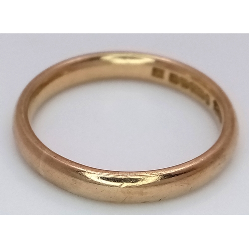 45 - A Vintage 9K Yellow Gold Band Ring. 4mm width. Size N. 2.7g. Full UK hallmarks.