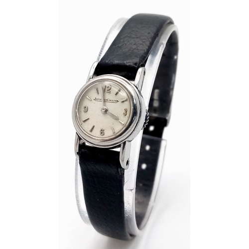 48 - A Vintage 1950s Jaeger LeCoultre Ladies Watch. Black leather strap. Stainless steel case - 18mm. Whi... 