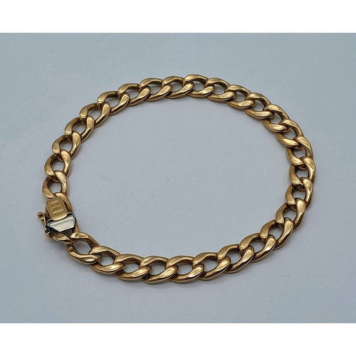 62 - A 9K Yellow Gold Flat Curb Link Bracelet. 18cm. 10g