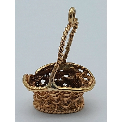 918 - A 9K Yellow Gold Basket Pendant/Charm. 2cm. 1.05g