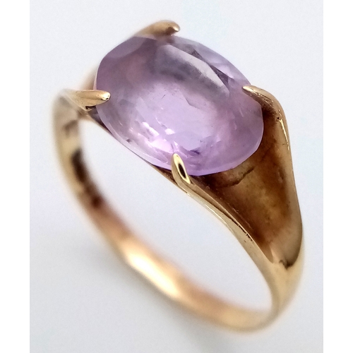 1142 - A Vintage 9K Yellow Gold Amethyst Ring. Oval cut. Size M. 2.1g