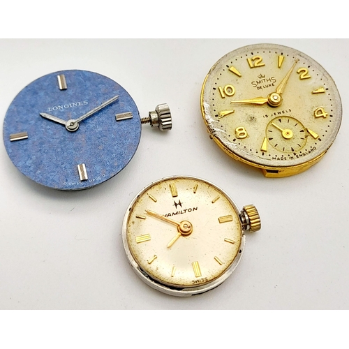 926 - THREE AUTOMATIC MOVEMENTS WITH DIALS LONGINES, HAMILTON & SMITHS DE LUXE FOR PARTS / SPARES . Ref: R... 