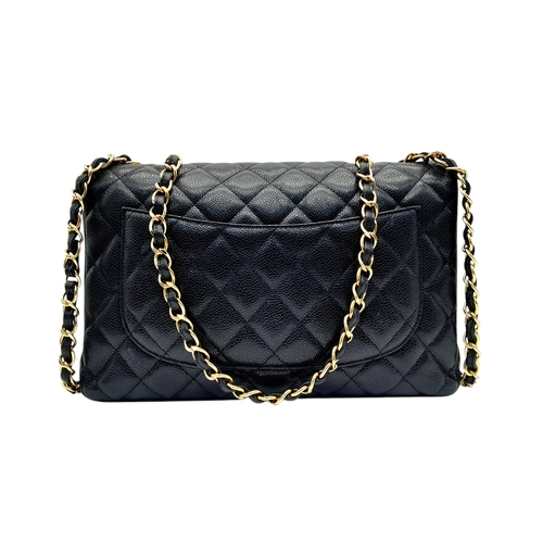 4 - A Chanel Black Caviar Leather Jumbo Classic Flap Bag. Black  caviar leather exterior with gold-toned... 