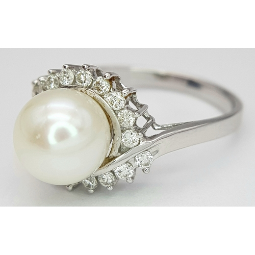 117 - AN 18K WHITE GOLD DIAMOND & PEARL SET RING. 3.8G. SIZE P. A/S1210.