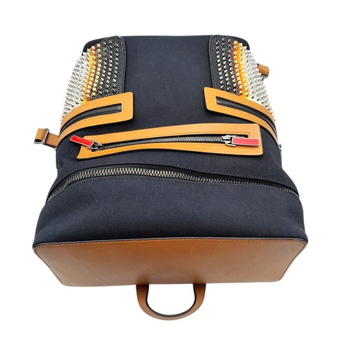 164 - A Christian Louboutin Apoloubi Backpack. Black canvas exterior with brown leather accents and gradie... 