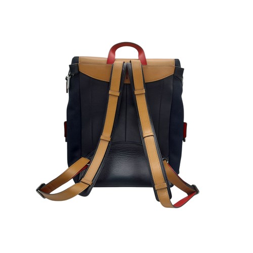 164 - A Christian Louboutin Apoloubi Backpack. Black canvas exterior with brown leather accents and gradie... 