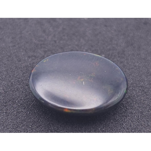 194 - A 6.37ct Impressive Ethiopian Black Fire Opal - ITLGR  Certified.