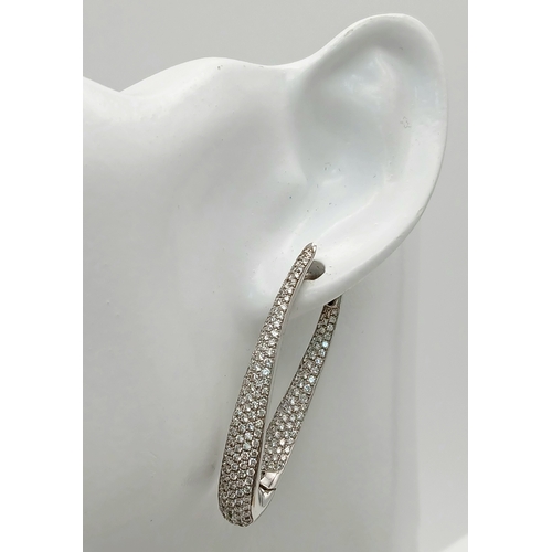 220 - A FABULOUS PAIR OF DIAMOND EARRINGS BY 