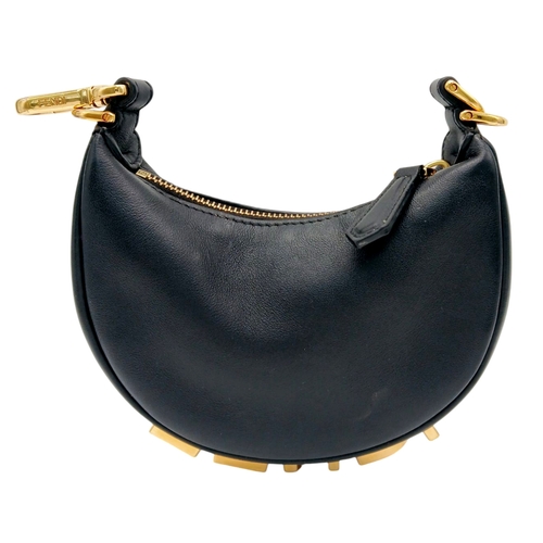 249 - A Fendi Black Leather Moon Micro Bag. Black leather exterior with gold-toned hardware and large FEND... 