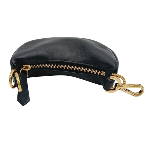 249 - A Fendi Black Leather Moon Micro Bag. Black leather exterior with gold-toned hardware and large FEND... 