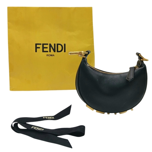 249 - A Fendi Black Leather Moon Micro Bag. Black leather exterior with gold-toned hardware and large FEND... 