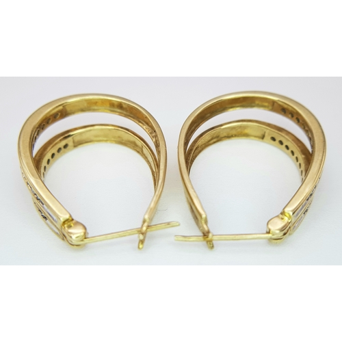 257 - A PAIR OF 9K YELLOW GOLD DOUBLE ROW DIAMOND SET EARRINGS. 4.6G. A/S1223.