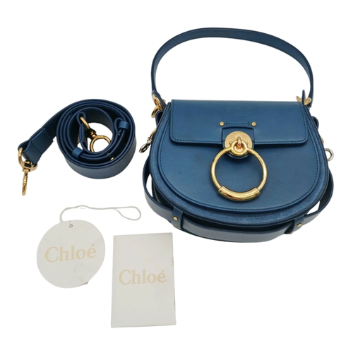 263 - A Chloé Blue Leather Tess Bag. Blue leather exterior with gold-toned hardware, top handle, detachabl... 