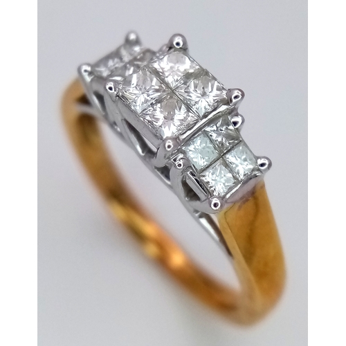 319 - AN 18K GOLD DIAMOND RING HAVING 12 SQUARE CUT DIAMONDS OF .60ctw .         3.8gms    size L . Ref: 2... 