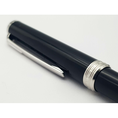 321 - A Montblanc Ball Point Pen. Black lacquered finish. 13.5cm. Good condition.