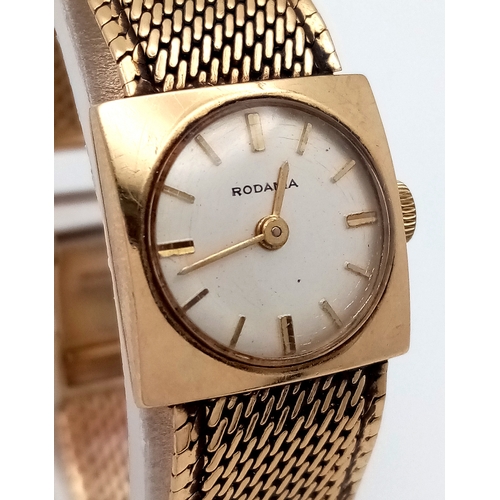 324 - A Vintage 9K Gold Rodania Ladies Watch. 9K Gold Bracelet and case - 18mm. White dial. Mechanical mov... 