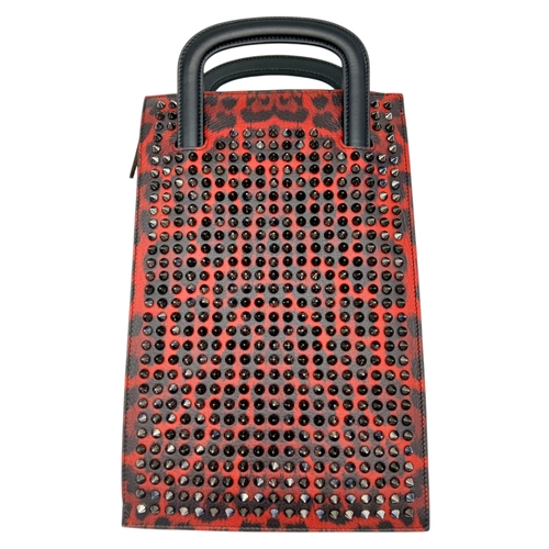 340 - A Christian Louboutin Red Leather Studded Clutch Shoulder Bag. Gunmetal coloured studs. Exterior poc... 