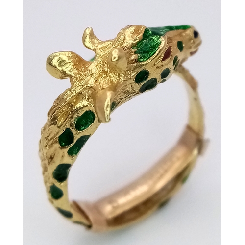 359 - A 9K Yellow Gold 'Pagoda' Ring in Animal Form. Size H 1/2. 6.2g